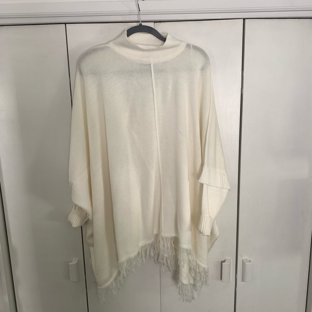 Beautiful white Sweater with fringe